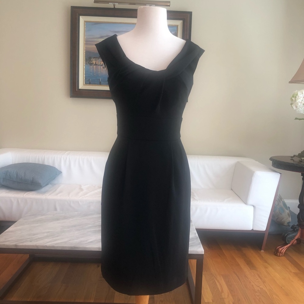 Black sleeveless dress. White House Black Market